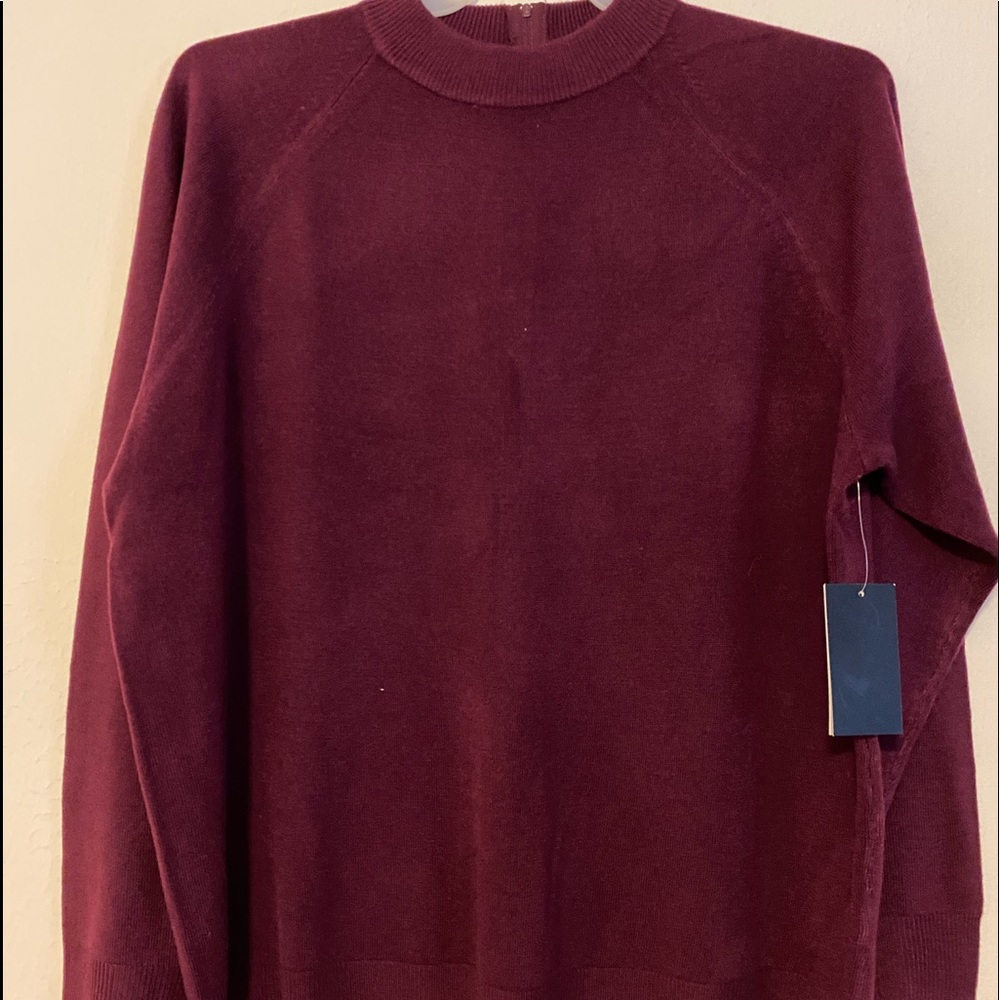 Woman’s maroon sweater